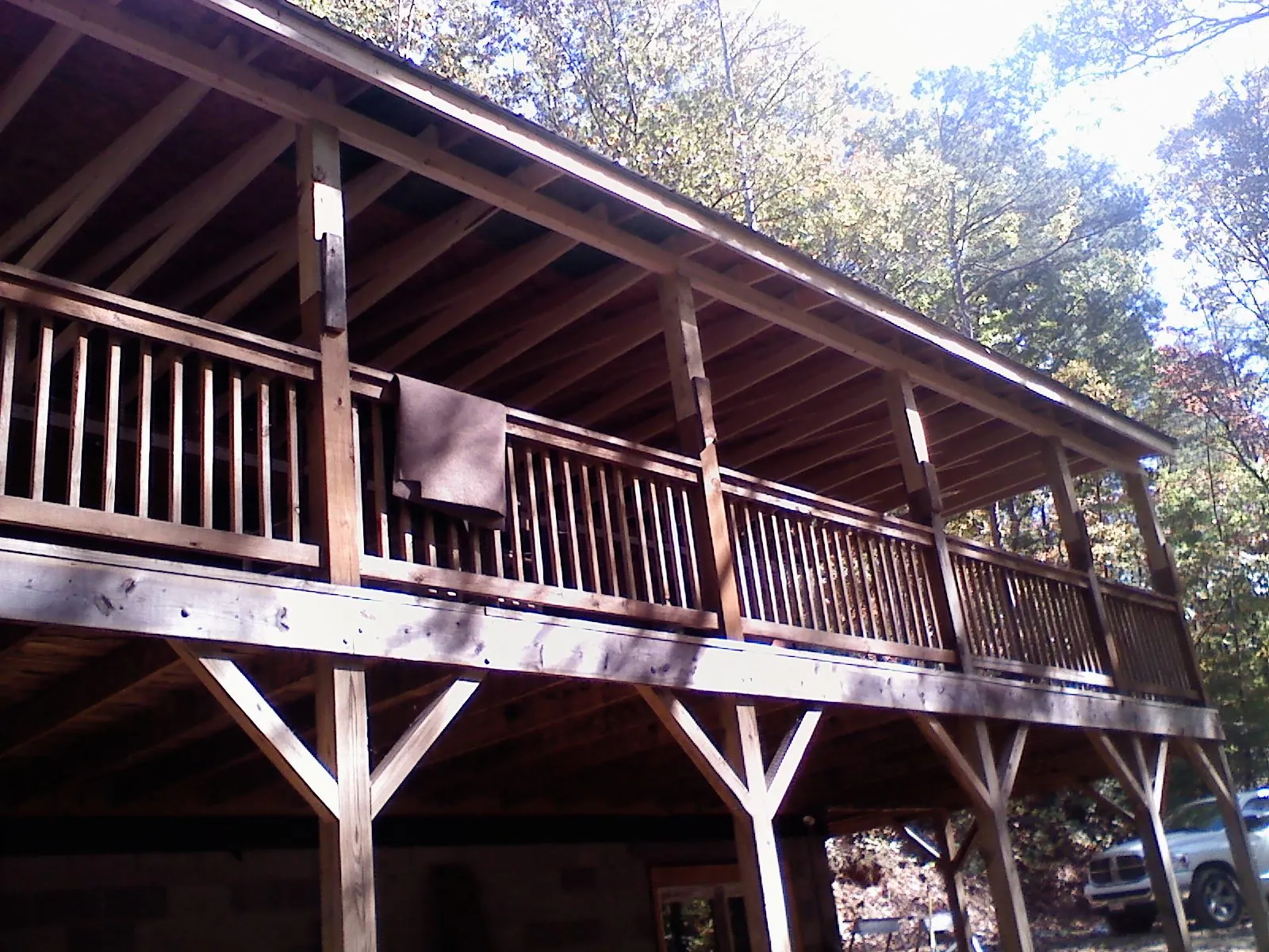Timber framing under a new elevated porch and deck — Roof Leak Repair in Levittown by Roofing Brothers